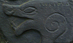 A Detail of a Norse Boar's Head Carving from Maughold Churchyard on the Isle of Man (Image Credit: Fee and Zoller 2000)