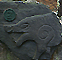 A Norse Boar's Head Carving from Maughold Churchyard on the Isle of Man (Image Credit: Fee and Zoller 2000)