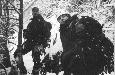 Fee and Regentin prepare to push for the summit of Mount Washington on 18 December 2001; click the thumbnail for full sized images of the ascent. (Image Credit: Crawford 2001)